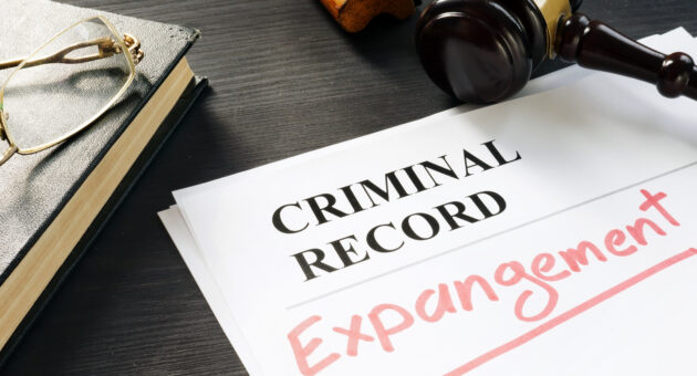 Can a Drug Charge Be Expunged from Your Record in Florida? 2 Drug charge expungement consultation in Florida office
